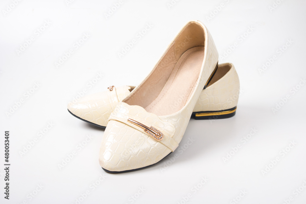 women's beige ballet flats on a white background. Women's light shoes slippers women's beige ballet flats on a white background. Women's light shoes slippers