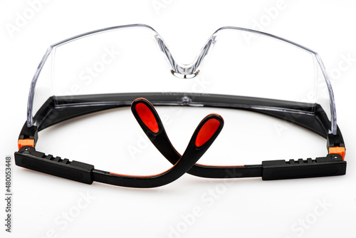 Protective safety glasses isolated on white background