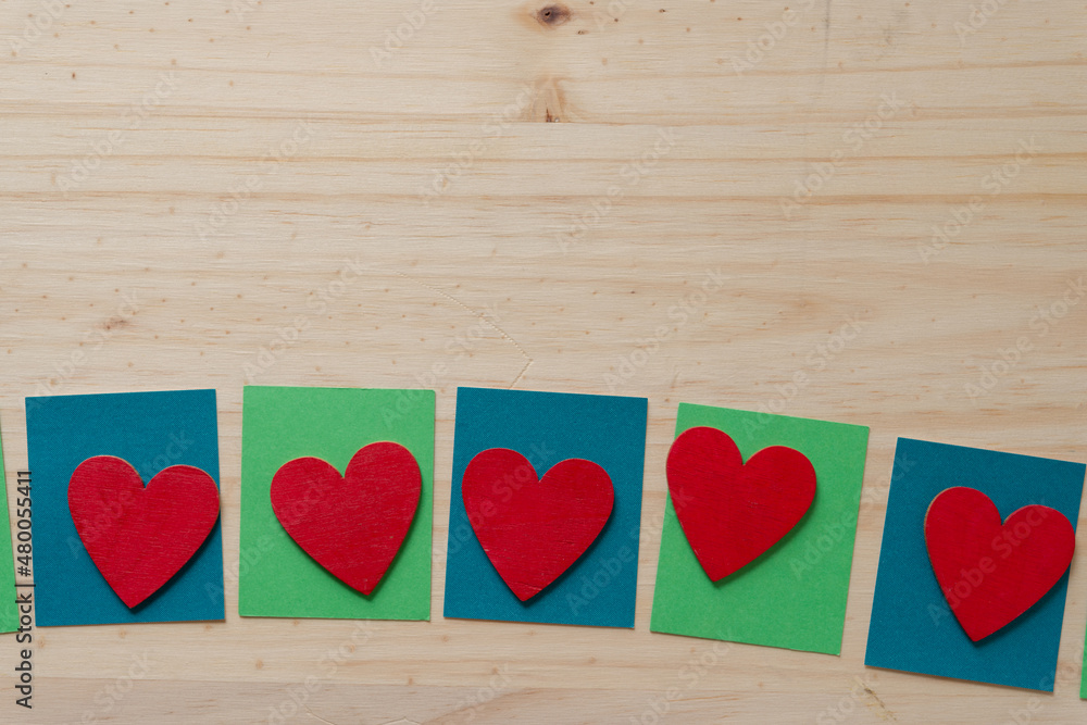 grungy wooden hearts on wood and paper grungy wooden hearts on wood and paper