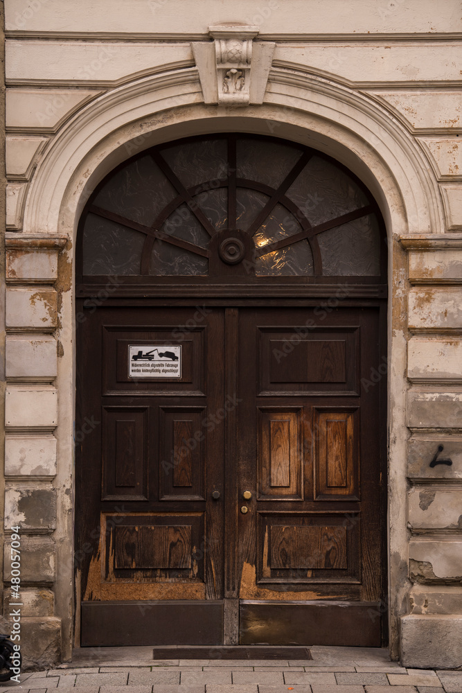 Munich, Germany - December 20 2021: Old Decorative Main Entrance Wooden Door. Munich, Germany - December 20 2021: Old Decorative Main Entrance Wooden Door.