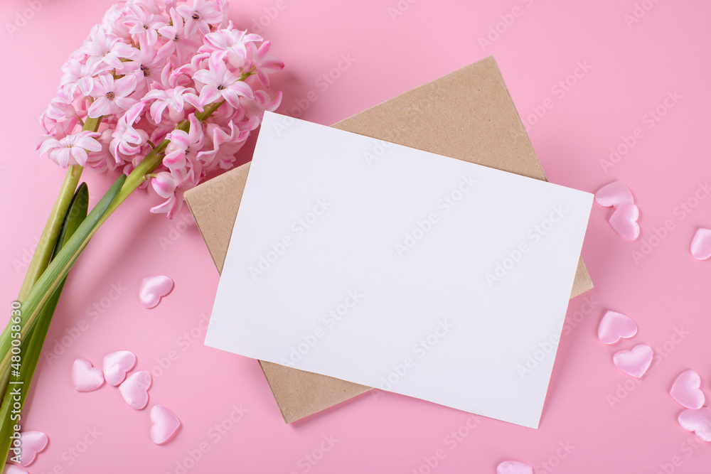 Blank wedding invitation stationery card mockup with envelope on pink background with hyacinth flowers and pink hearts, feminine blog. Valentines day card, valentines day background, mothers day Blank wedding invitation stationery card mockup with envelope on pink background with hyacinth flowers and pink hearts, feminine blog. Valentines day card, valentines day background, mothers day