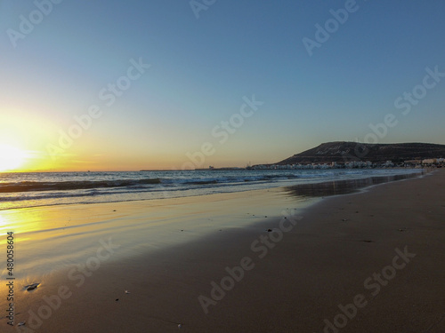 Beach photo taken in Agadir in Morocco in the background you can can see the monument in the hill locally known as Agadir Oufella in the summer time.