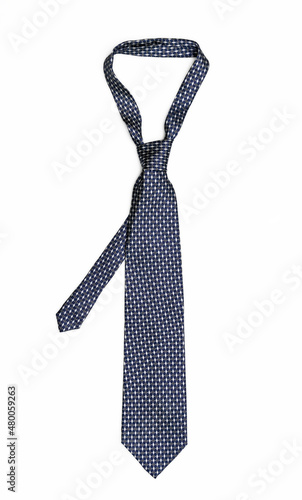 Blue silk tie isolated on white background. Diagonal knot 