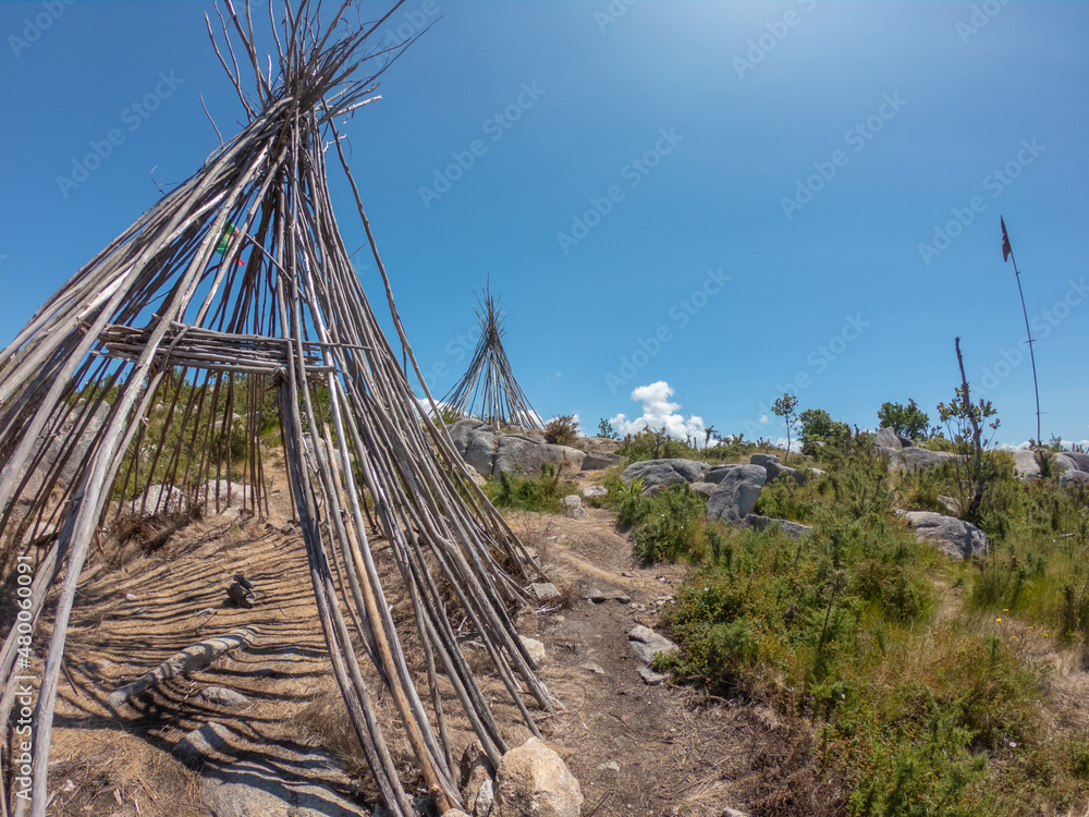The Patio das Cabanas (Huts Courtyard) in Vila Cha, Esposende, Portugal. Wooden stick hut house, looking like Indian tepee with a beautiful panorama view towards the Portuguese coastline. The Patio das Cabanas (Huts Courtyard) in Vila Cha, Esposende, Portugal. Wooden stick hut house, looking like Indian tepee with a beautiful panorama view towards the Portuguese coastline.