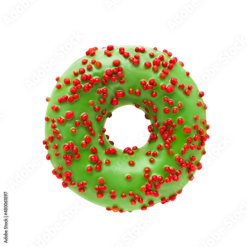 Donut in green glaze with red sprinkles isolated over white background with clipping path