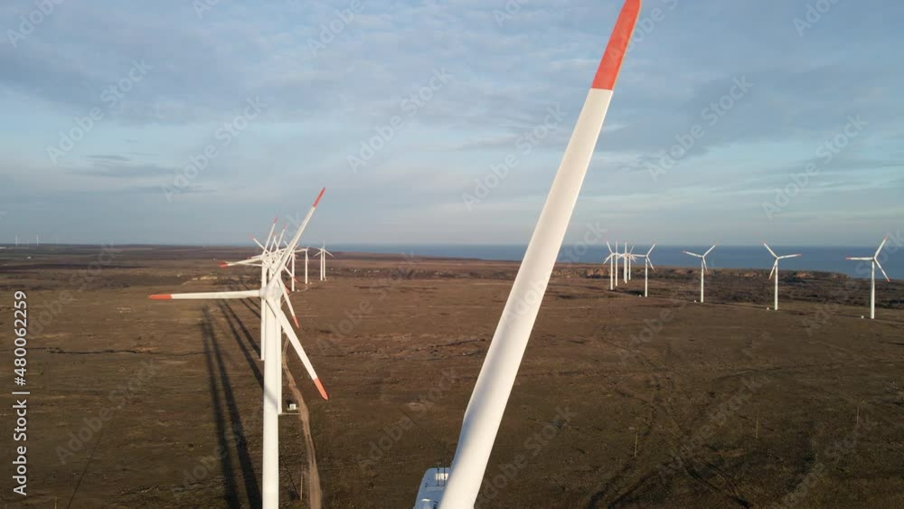 Close up Aerial view of wind turbine propellers on a wind farm Close up Aerial view of wind turbine propellers on a wind farm