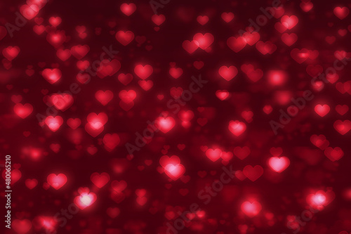 Heart shape bokeh red background for valentines day greeting card or wallpaper
