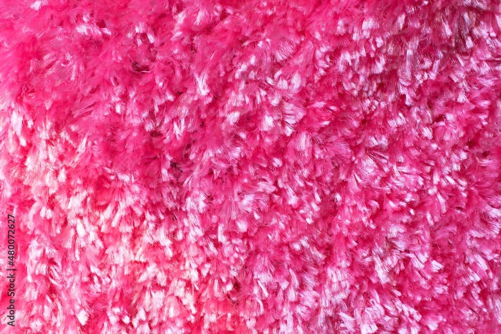 Close-up of pink wool texture used for beautiful abstract pink fur background design Close-up of pink wool texture used for beautiful abstract pink fur background design