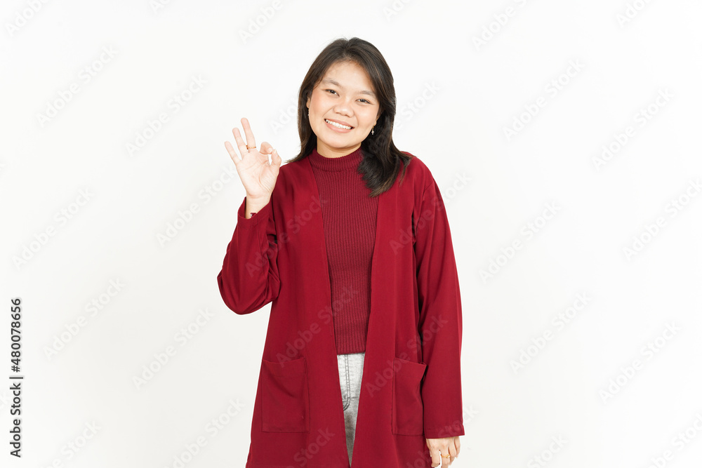 Showing Ok Sign Of Beautiful Asian Woman Wearing Red Shirt Isolated On White Background Showing Ok Sign Of Beautiful Asian Woman Wearing Red Shirt Isolated On White Background