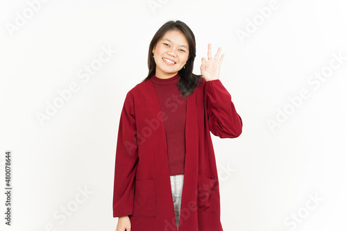 Showing Ok Sign Of Beautiful Asian Woman Wearing Red Shirt Isolated On White Background © Sino Images Studio