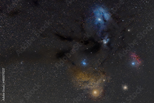 The region of Antares with emission and reflection nebula and globular cluster M4 on the night sky