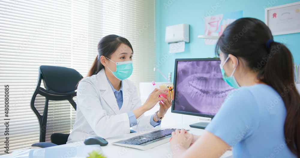 woman at dental clinic woman at dental clinic
