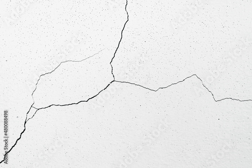 Image for use as a background, diagonally cracked white wall, which is still a small line, not very large. Which the renovation is still easy