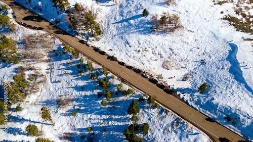 Aerial View of Road in Snow Covered Mountain Rigde