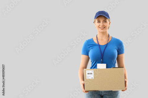 Female courier with parcel ...