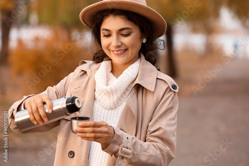 Beautiful woman with thermo...