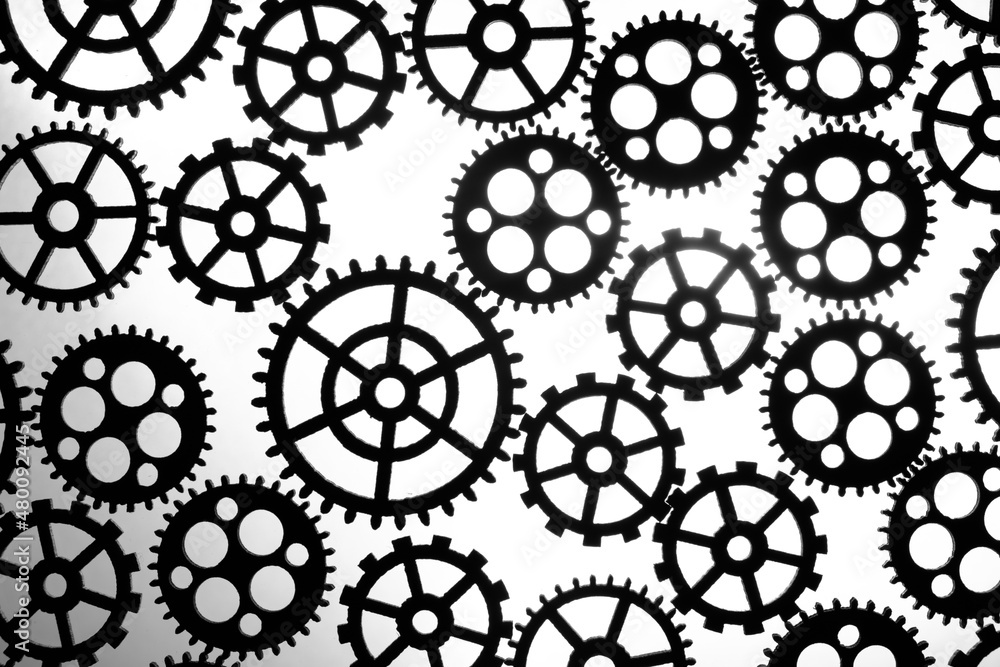 Abstract background black silhouettes, variety gears on white background. Abstract background black silhouettes, variety gears on white background.