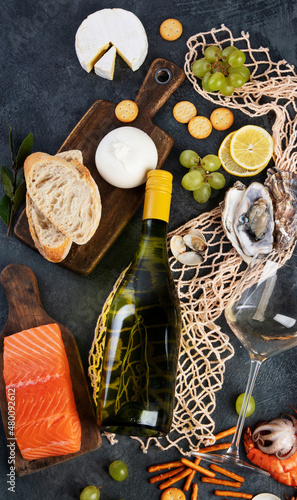 White wine Pinot Grigio with seafood and snacks.