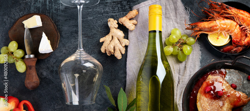 Konstfotografi White wine Riesling with duck and snacks.