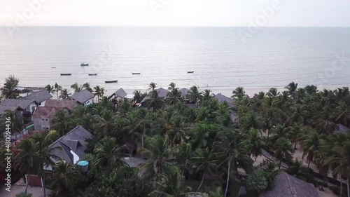 Aerial view of beach town in northeast Brazil. Barra Grande, in Piauí, with plenty of coconut trees.