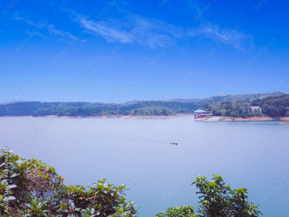 A view of a lake with blue water and sky taken in Indonesia