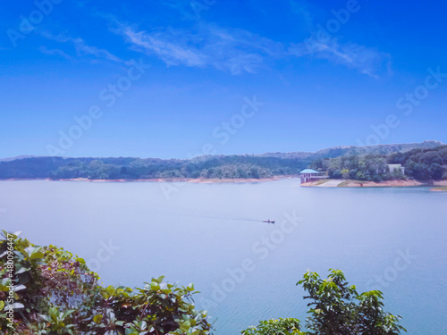 Fototapeta Naklejka Na Ścianę i Meble -  A view of a lake with blue water and sky taken in Indonesia