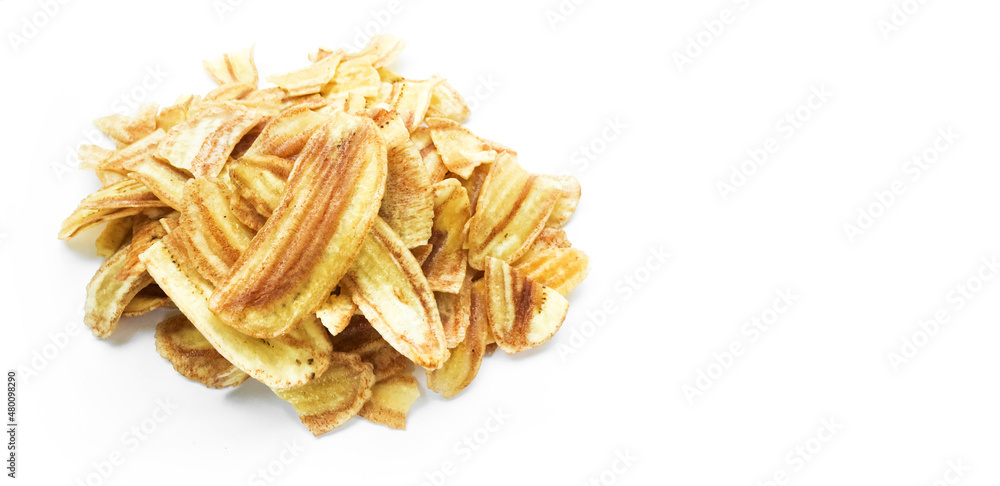 Asian caltivated banana or pisang awak banana cracker ro banana chips on white background, soft and selective focus. Asian caltivated banana or pisang awak banana cracker ro banana chips on white background, soft and selective focus.