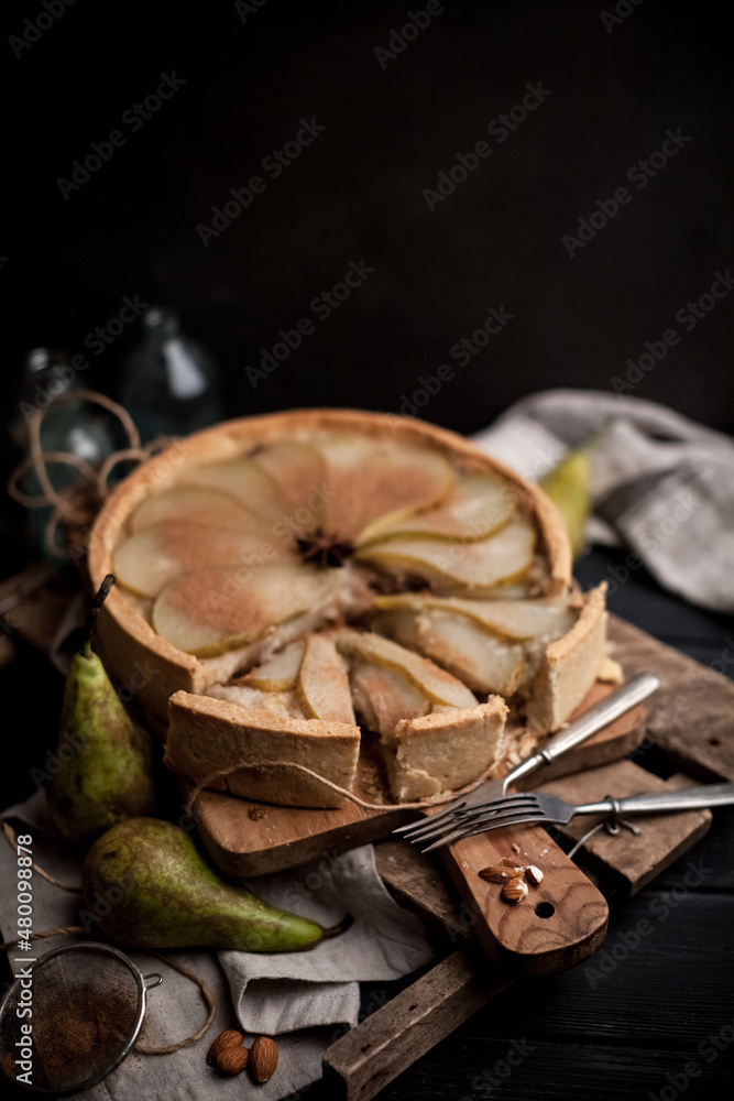 Homemade pear tart with cinnamon and sugar. Selective focus Homemade pear tart with cinnamon and sugar. Selective focus