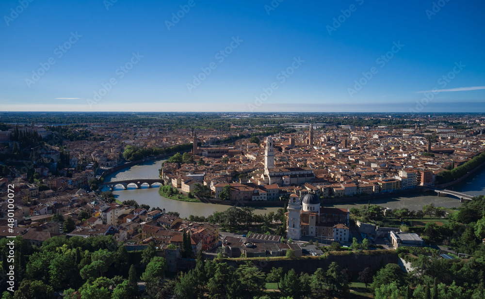 Aerial panorama of Verona, Italy. Panoramic top view of Verona city center. Historic Italian town panorama top view. Italian medieval city drone view. Italian churches in the old city aerial view.