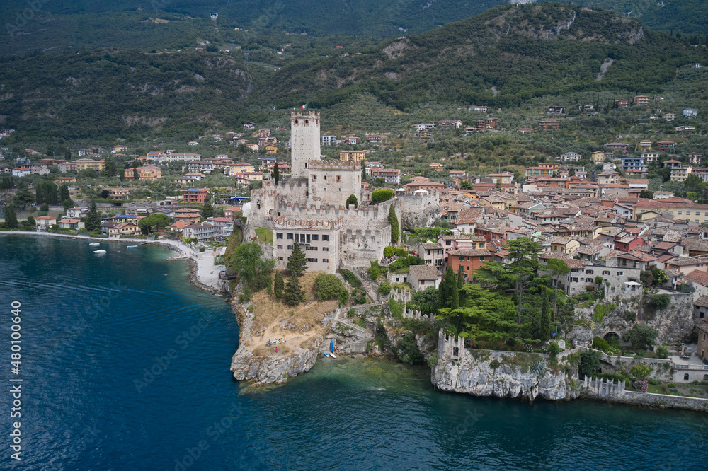 Castle of Malcesine, panorama aerial view. Castle on Lake Garda top view. The historic town of Malcesine on Lake Garda, Italy.