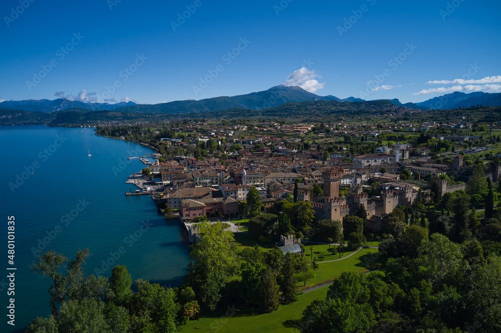 Top view of the historic part of the city Lazise Castle on the coastline of Lake Garda. Lazise Lake Garda Italy. Aerial view of the Scaliger Castle of Lazise. Panorama of the historic town of Lazise