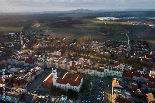 Aerial view of european city with architecture buildings and streets. Central square of small town cityscape, top view