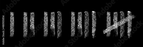 Tally marks count Chalk on a black wall or prison wall sticks lines counter.