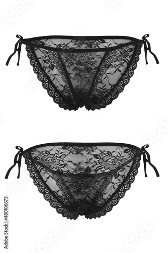 Detail shot of black lace erotic panties with ties, lace frills and a floral pattern. The sexy lingerie is isolated on the white background. Front and back views. 