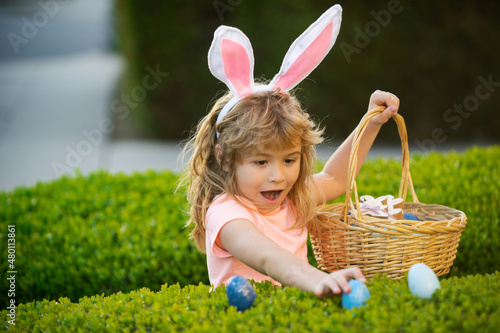 Photography Child gathering eggs, easter egg hunt concept