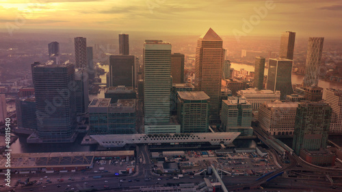 Aerial drone photo of iconic skyscraper banking and business complex of Canary Wharf at sunset  Docklands  London  United Kingdom
