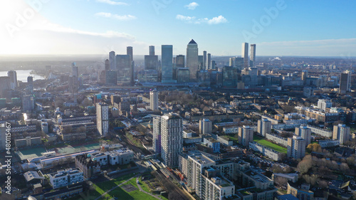 Aerial drone distant shot of iconic skyscraper banking and business complex of Canary Wharf  Docklands  London  United Kingdom