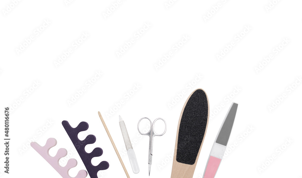 pedicure tools toe separator, nail file, grater and pumice stone for feet isolated on white background, copy space pedicure tools toe separator, nail file, grater and pumice stone for feet isolated on white background, copy space
