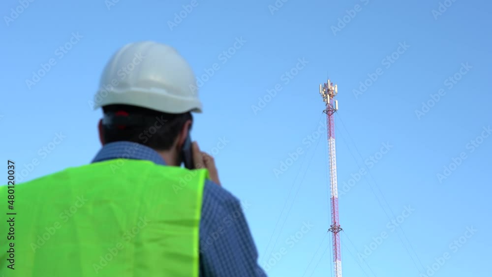 Cellular Engineer next to the Mast Cellular Engineer next to the Mast