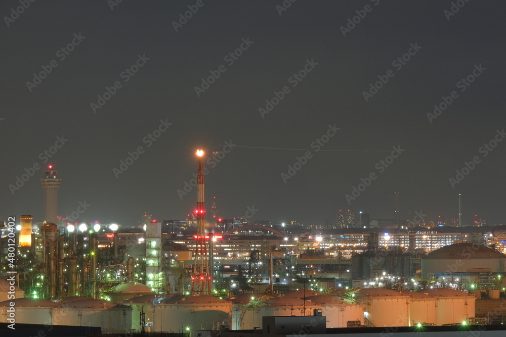 Fototapeta premium Factories glowing in the night