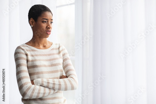 Bad Mood Concept. Upset African American Lady Standing Near Window At Home Free Download Bad Mood Concept. Upset African American Lady Standing Near Window At Home - GFXLoad