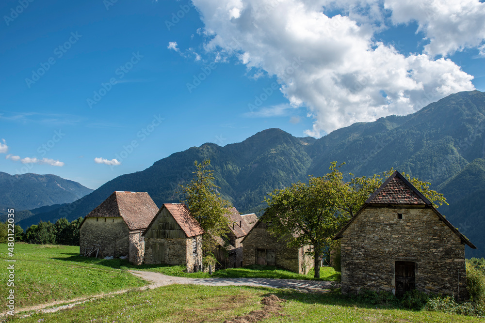 Summer in the stables of Orias in Carnia. Ancient constructions