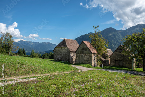 Summer in the stables of Orias in Carnia. Ancient constructions photo