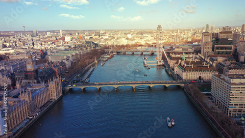 Aerial drone photo of iconic City of Westminster with houses of Parliament  Big Ben and Westminster Abbey in front of river Thames  London  United Kingdom