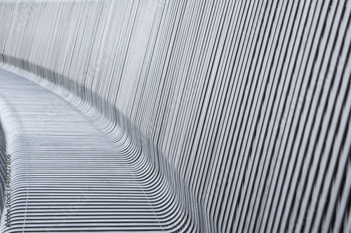 rows of even metallic gray stripes close-up.