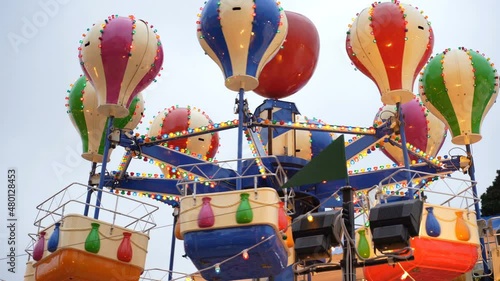 Christmas carousel with children and parents on Red Square in Moscow. High quality 4k footage