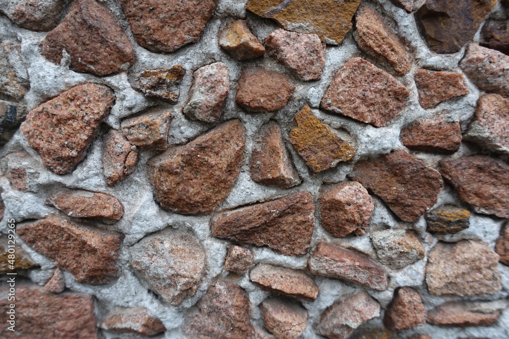 Multicolored gravel pebble dash on the wall Multicolored gravel pebble dash on the wall