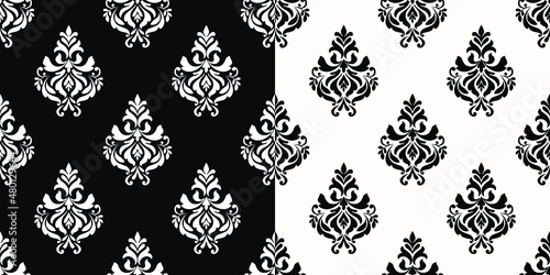 Seamless black and white damask pattern design. Ornamental background.