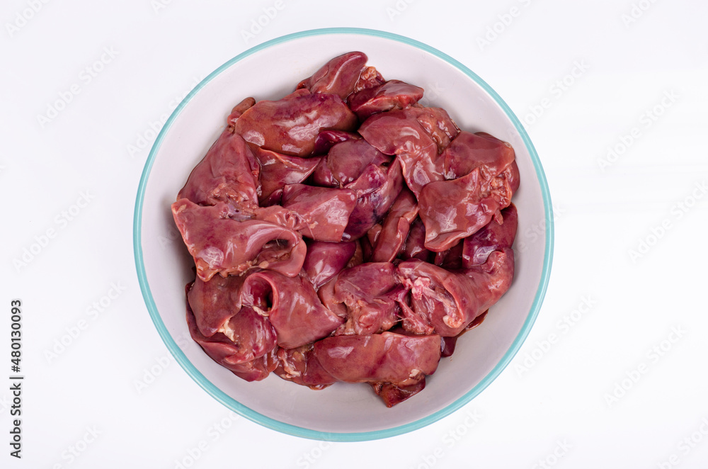 Healthy offal. Raw chicken liver on white. Studio Photo Healthy offal. Raw chicken liver on white. Studio Photo