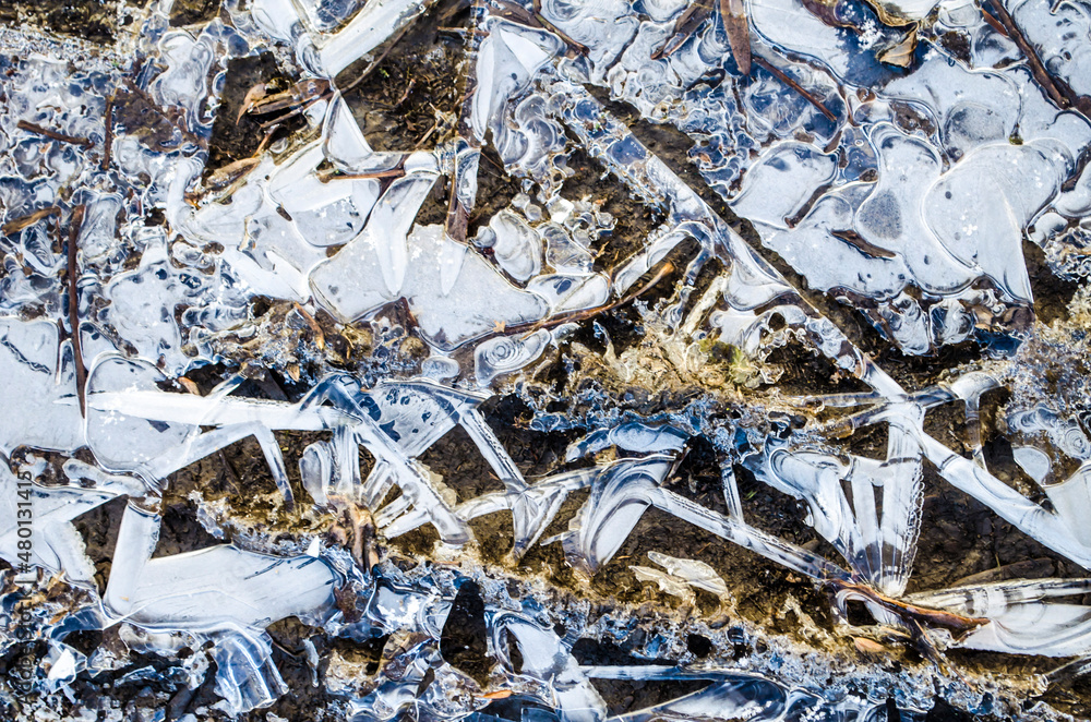 Ice texture with crystals and graphic patterns. Winter textured surface photo. Ice texture with crystals and graphic patterns. Winter textured surface photo.